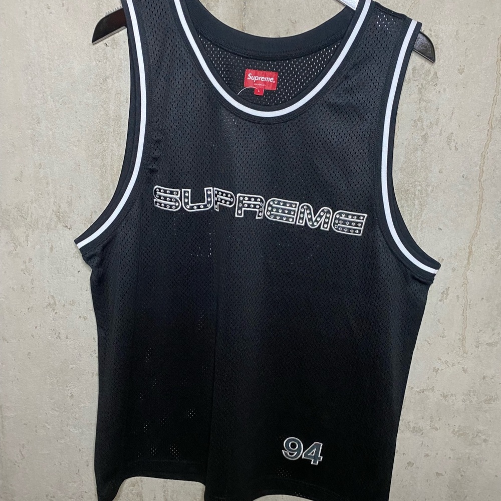 Black Supreme studded jersey.